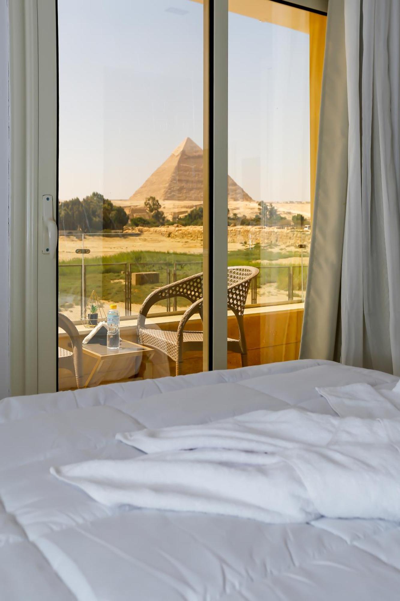 Pyramids Land Palace Kafrat al Jabal Экстерьер фото